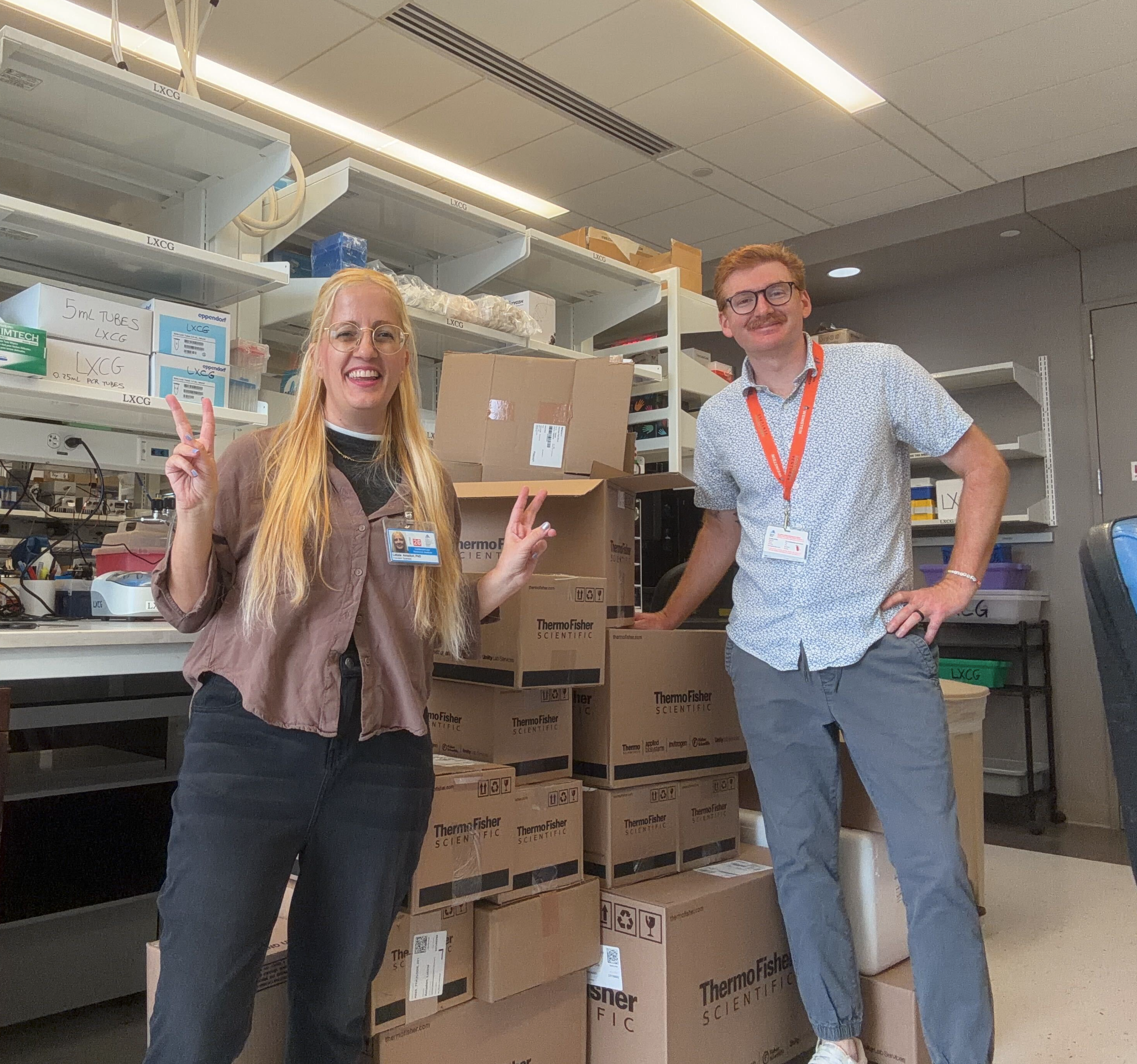 Drs. Monroe and Amadori unboxing supplies